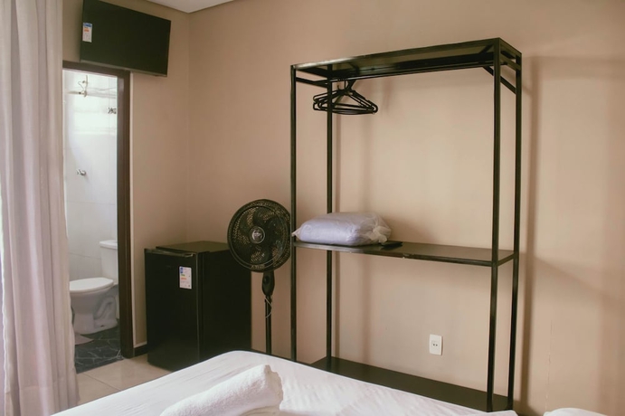 Imagen de la habitación del Hotel Kitnet no centro de Betim. Foto 5