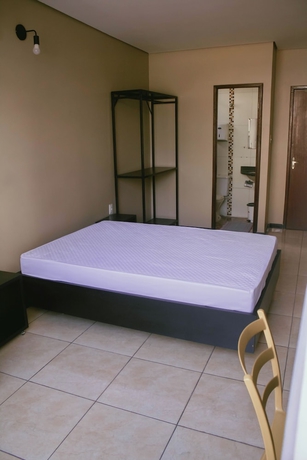 Imagen de la habitación del Hotel Kitnet no centro de Betim. Foto 6
