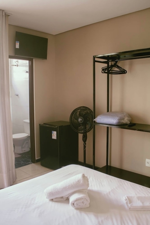 Imagen de la habitación del Hotel Kitnet no centro de Betim. Foto 7