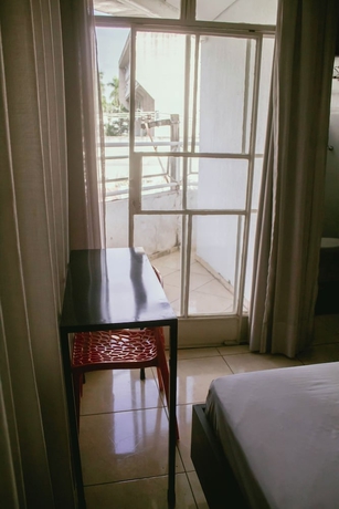 Imagen de la habitación del Hotel Kitnet no centro de Betim. Foto 8