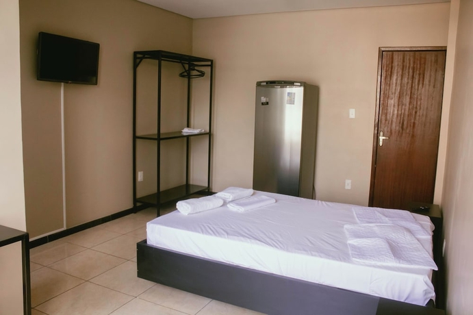 Imagen de la habitación del Hotel Kitnet no centro de Betim. Foto 9