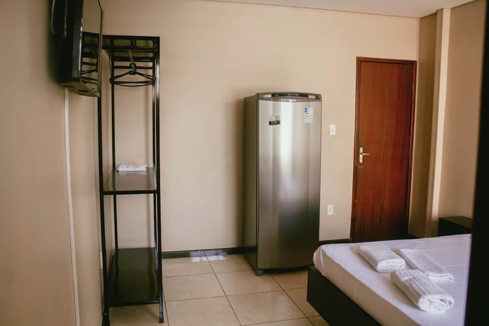 Imagen de la habitación del Hotel Kitnet no centro de Betim. Foto 11