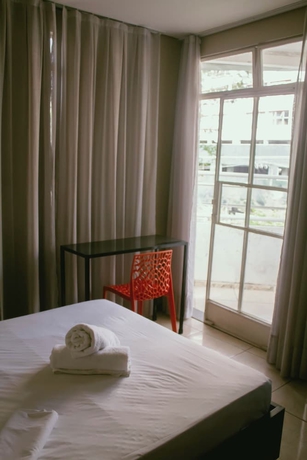 Imagen de la habitación del Hotel Kitnet no centro de Betim. Foto 12