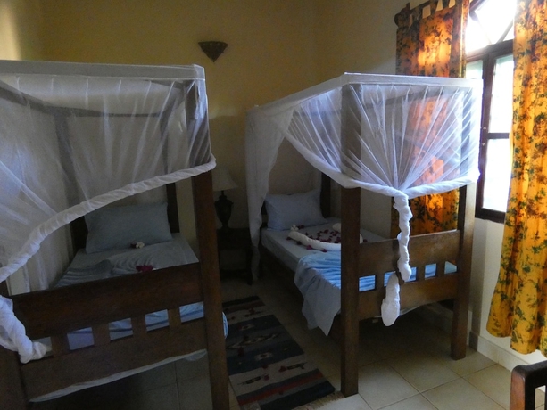 Imagen de la habitación del Hotel Kiwengwa Bungalow Boutique Resort. Foto 11