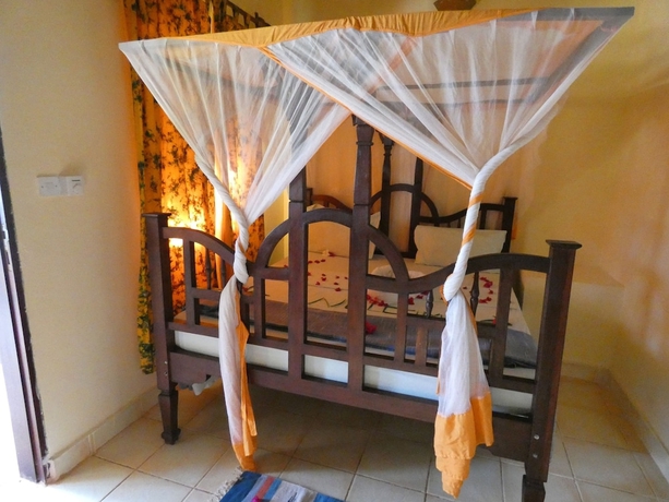 Imagen de la habitación del Hotel Kiwengwa Bungalow Boutique Resort. Foto 12