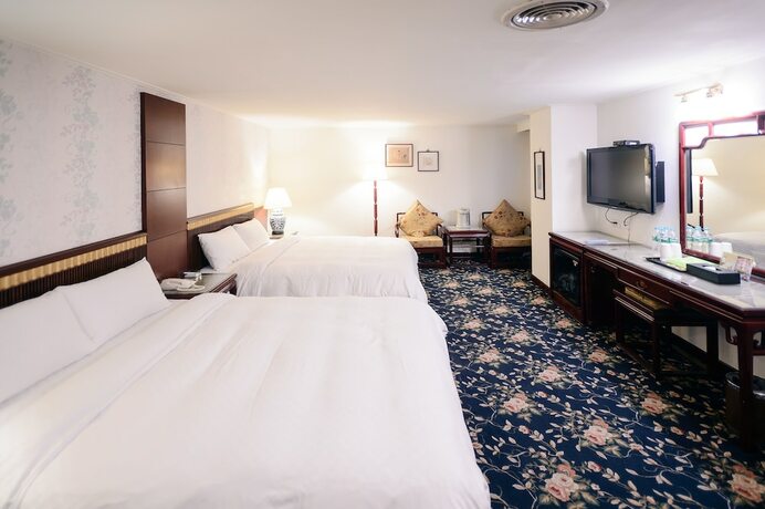 Imagen de la habitación del Hotel Kiwi Express Mrt Wen Xin - Feng Jia Branch 1. Foto 17