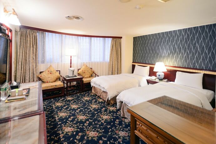 Imagen de la habitación del Hotel Kiwi Express Mrt Wen Xin - Feng Jia Branch 1. Foto 20