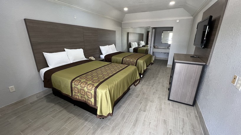 Imagen de la habitación del Hotel Kiwi Inn Capital O Houston - Hwy 249. Foto 4