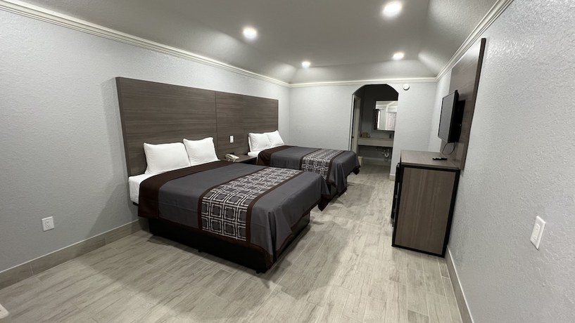 Imagen de la habitación del Hotel Kiwi Inn Capital O Houston - Hwy 249. Foto 7