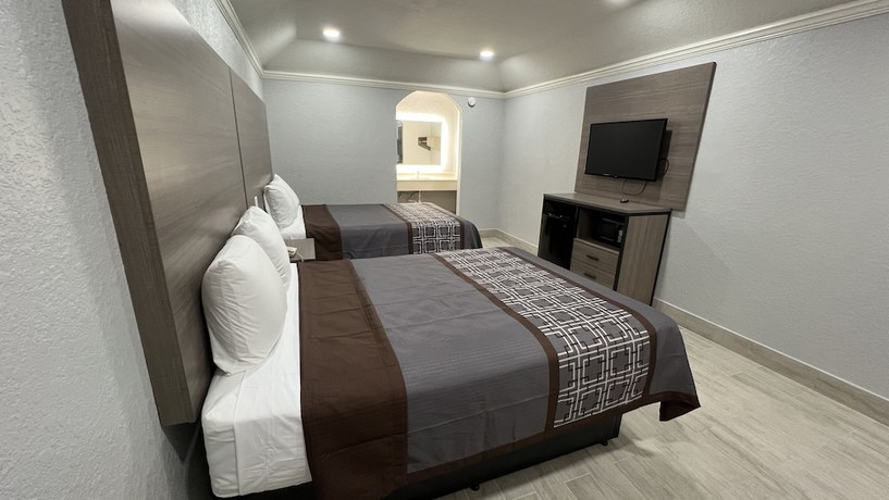 Imagen de la habitación del Hotel Kiwi Inn Capital O Houston - Hwy 249. Foto 8