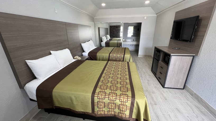 Imagen de la habitación del Hotel Kiwi Inn Capital O Houston - Hwy 249. Foto 9