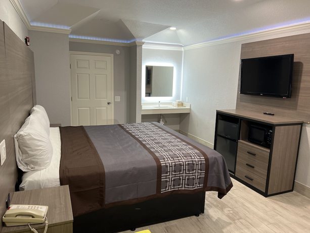Imagen de la habitación del Hotel Kiwi Inn Capital O Houston - Hwy 249. Foto 11