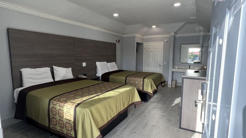 Imagen de la habitación del Hotel Kiwi Inn Capital O Houston - Hwy 249. Foto 12