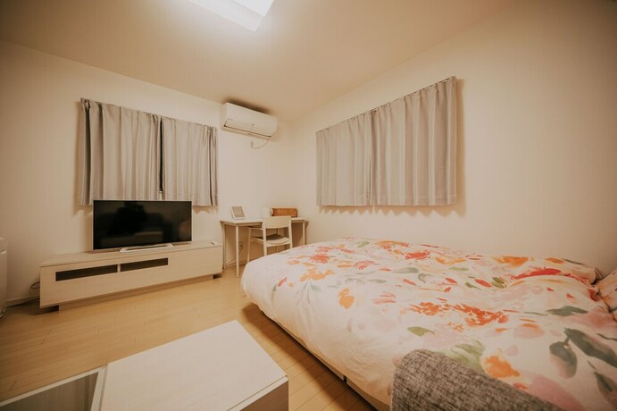 Imagen de la habitación del Hotel Kizugawa Villas. Foto 19