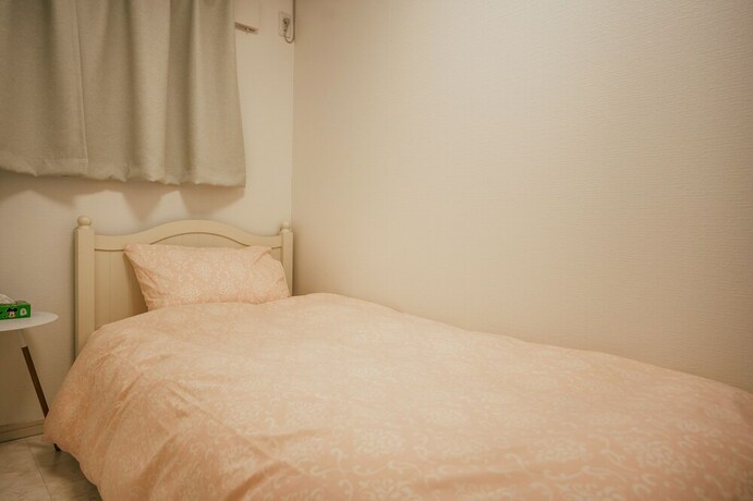 Imagen de la habitación del Hotel Kizugawa Villas. Foto 28