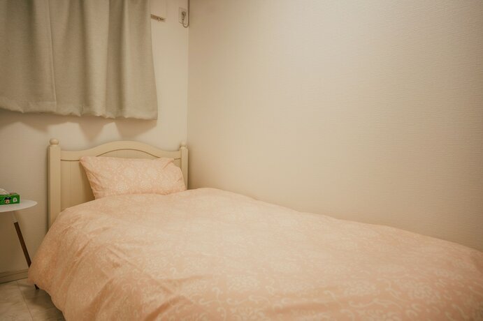 Imagen de la habitación del Hotel Kizugawa Villas. Foto 30
