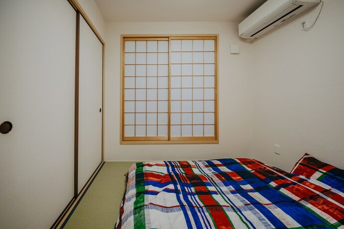 Imagen de la habitación del Hotel Kizugawa Villas. Foto 33