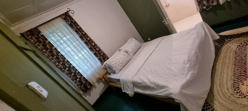 Imagen de la habitación del Hotel Kizumba House. Foto 17