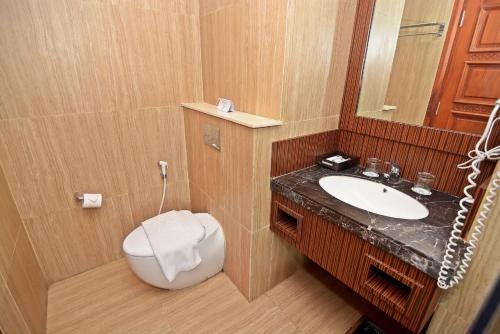 Imagen de la habitación del Hotel Kj Yogyakarta. Foto 7