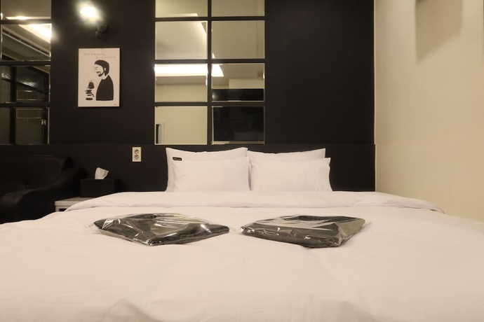 Imagen de la habitación del Hotel Kkulbam Stay. Foto 1