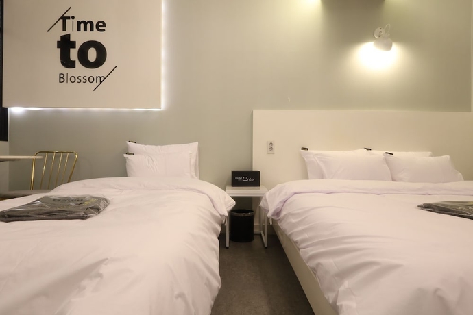 Imagen de la habitación del Hotel Kkulbam Stay. Foto 5