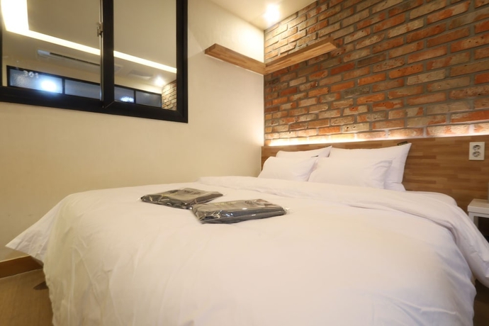 Imagen de la habitación del Hotel Kkulbam Stay. Foto 8