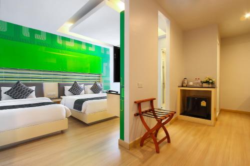 Imagen de la habitación del Hotel Klassique Sukhumvit. Foto 8