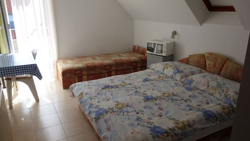 Imagen de la habitación del Hotel Klassz Apartmanh&aacute;z. Foto 17