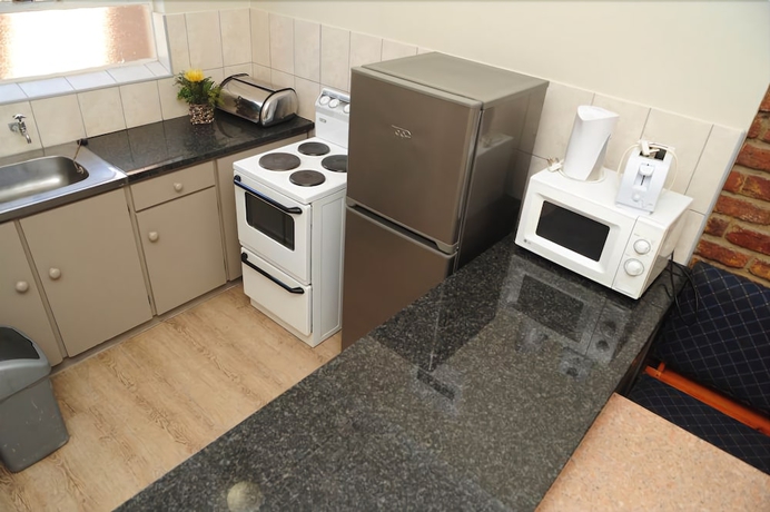Imagen de la habitación del Hotel Kleinplaas. Foto 4