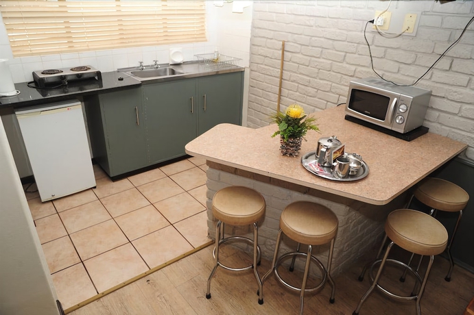 Imagen de la habitación del Hotel Kleinplaas. Foto 12