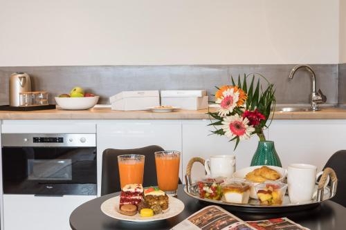 Imagen de la habitación del Hotel Klepsydra Urban Suites. Foto 8