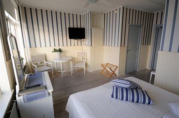 Imagen de la habitación del Hotel Klitterhus Havsbadshotell. Foto 7