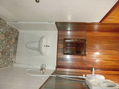 Imagen de la habitación del Hotel Klong Suan Plu Resort. Foto 2