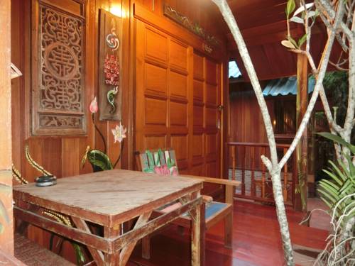 Imagen de la habitación del Hotel Klong Suan Plu Resort. Foto 7