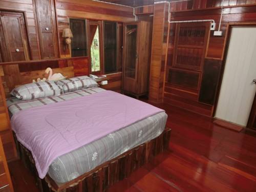 Imagen de la habitación del Hotel Klong Suan Plu Resort. Foto 9