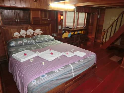 Imagen de la habitación del Hotel Klong Suan Plu Resort. Foto 10