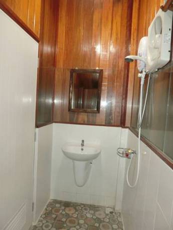 Imagen de la habitación del Hotel Klong Suan Plu Resort. Foto 16