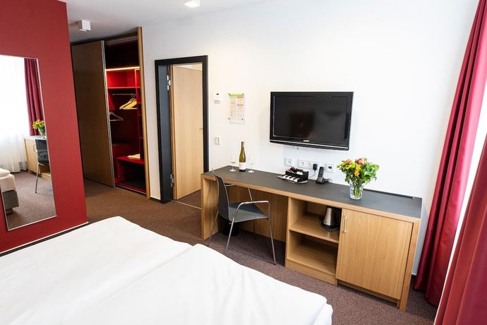 Imagen de la habitación del Hotel Kloster Eberbach. Foto 14