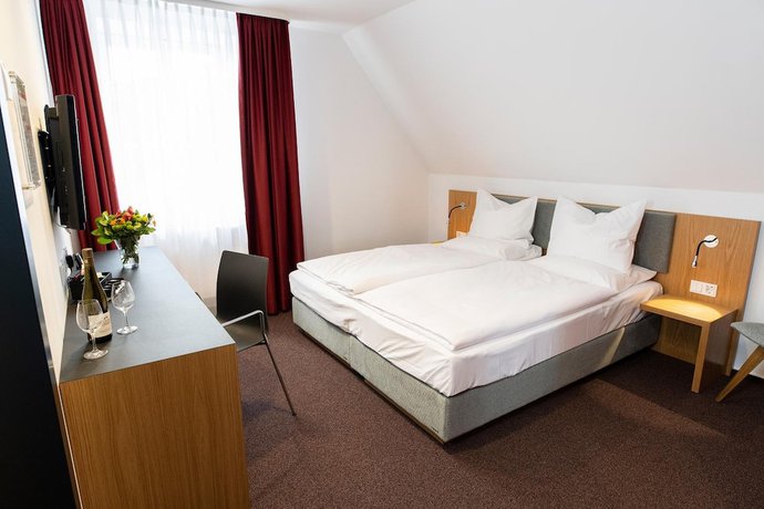 Imagen de la habitación del Hotel Kloster Eberbach. Foto 16