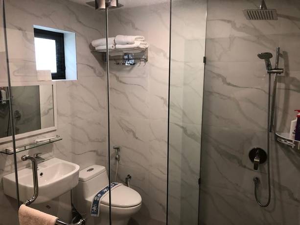 Imagen de la habitación del Hotel Kluang Container Swimming Pool Hotel. Foto 7