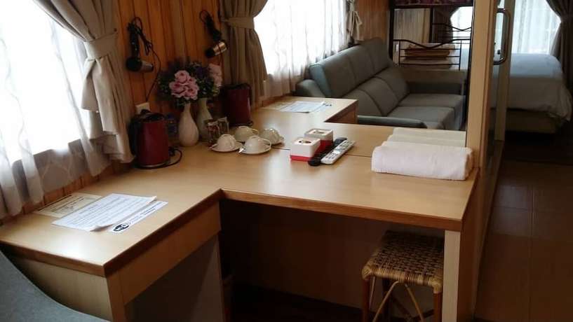 Imagen de la habitación del Hotel Kluang Container Swimming Pool Hotel. Foto 10