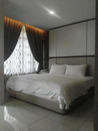 Imagen de la habitación del Hotel Kluang Container Swimming Pool Hotel. Foto 12