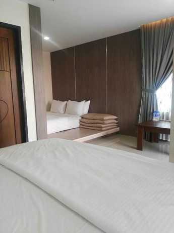 Imagen de la habitación del Hotel Kluang Container Swimming Pool Hotel. Foto 13