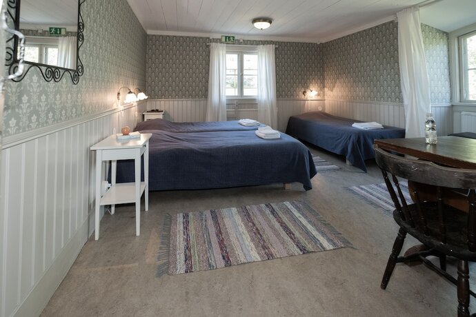 Imagen de la habitación del Hotel Klubbensborg. Foto 16