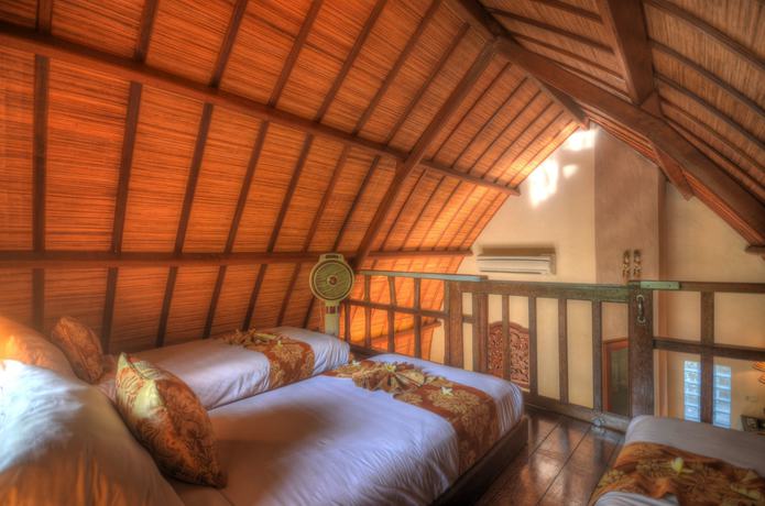 Imagen de la habitación del Hotel Klumpu Bali Resort. Foto 16