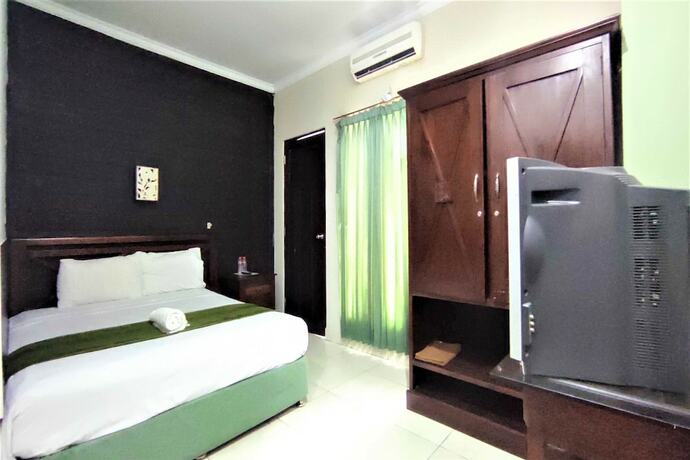 Imagen de la habitación del Hotel Klungkung Tower. Foto 11