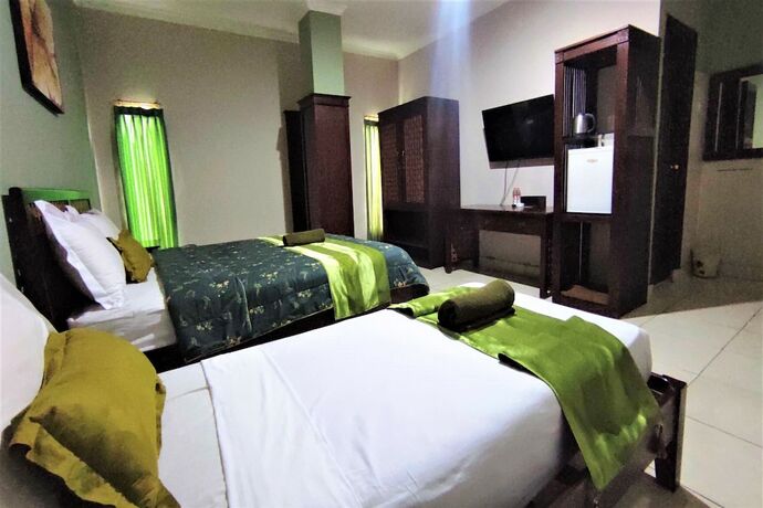Imagen de la habitación del Hotel Klungkung Tower. Foto 13