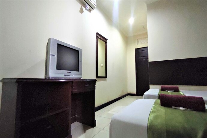 Imagen de la habitación del Hotel Klungkung Tower. Foto 15