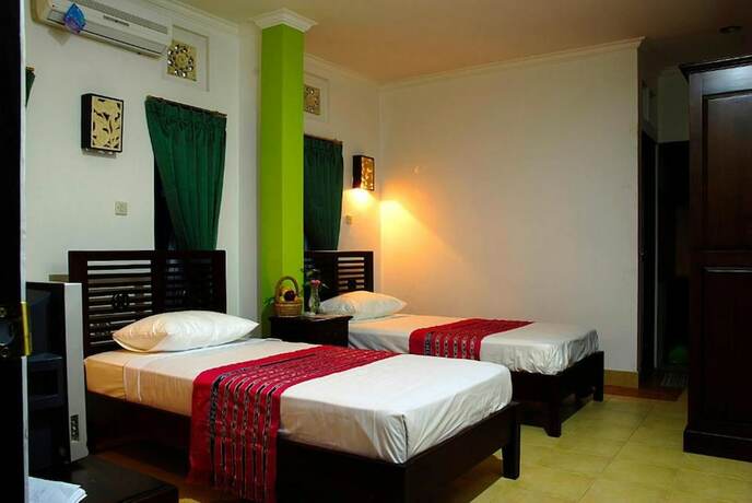 Imagen de la habitación del Hotel Klungkung Tower. Foto 16