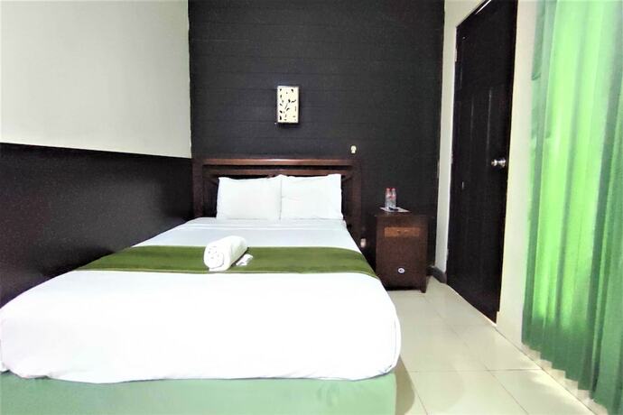 Imagen de la habitación del Hotel Klungkung Tower. Foto 17